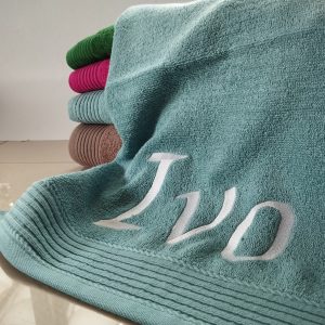 Handtücher mit einzeiligen Schritzug